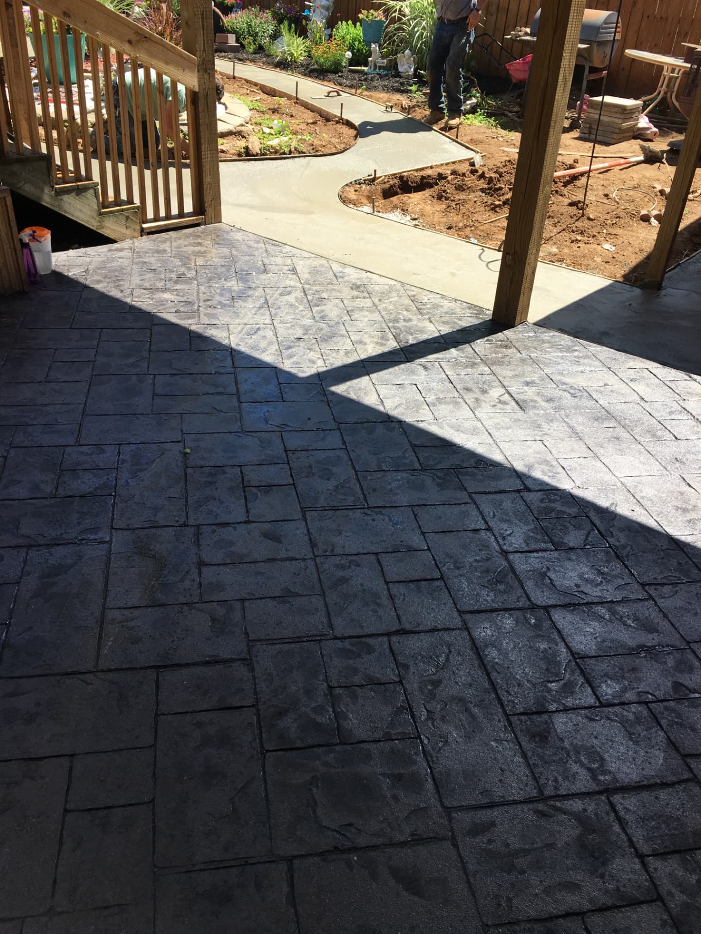 Finished stamped concrete patio poured by Adam's Homegrown Concrete in Fargo, North Dakota